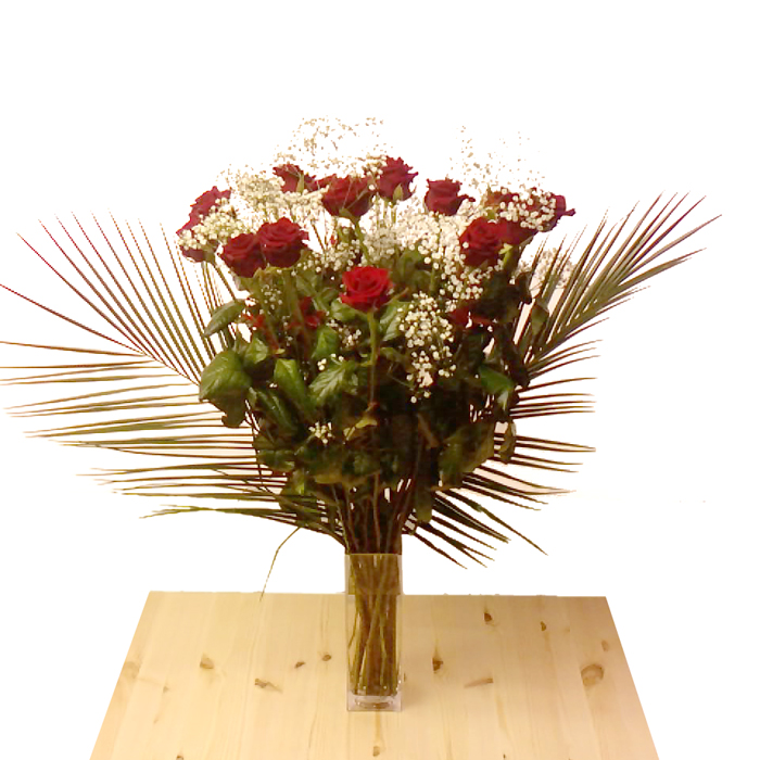 20 Roses with foliage in vase